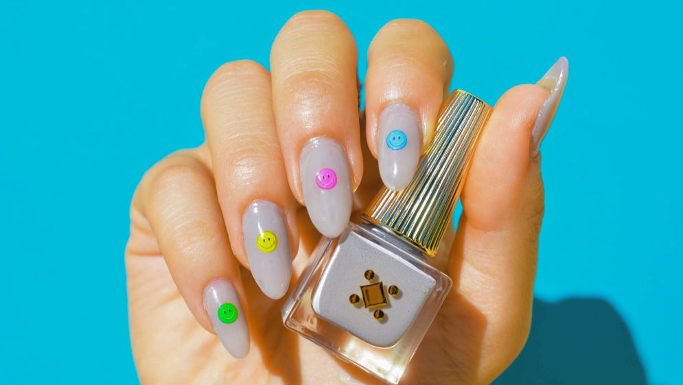 Perfect Manicure And Natural Nails. Attractive Modern Nail Art Design. Gel  Polish Applied. Stock Photo, Picture and Royalty Free Image. Image 93250883.